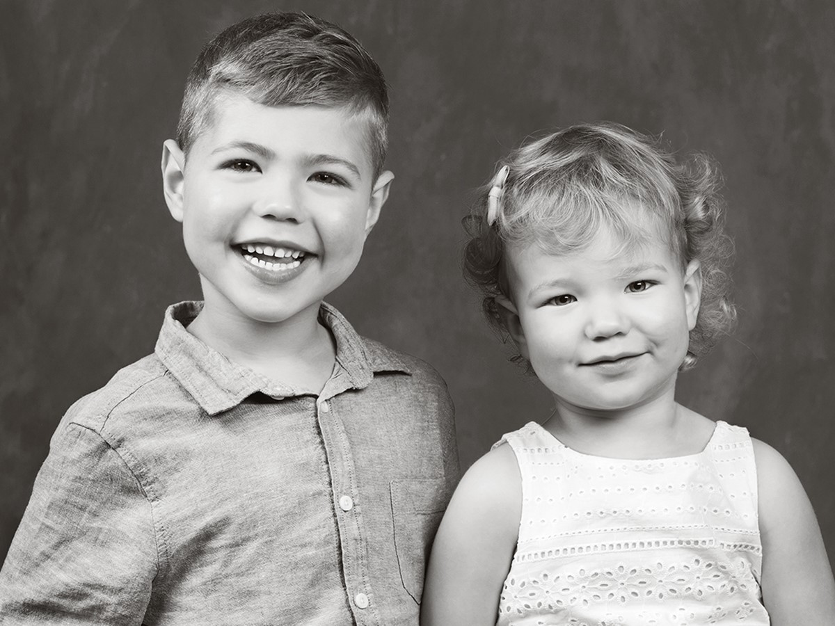 Black and white portrait of Jacob and Reiley Moore.